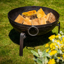 Load image into Gallery viewer, 80cm fire pit in garden showing the drop handles and metal stand.