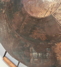 Load image into Gallery viewer, The 80cm fire pit lid showing the metal riveted plates and handle.