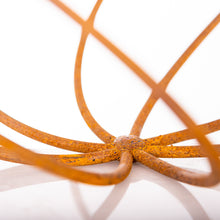 Load image into Gallery viewer, The base of the rustic garden sphere ball ornament showing the rusted patina finish.