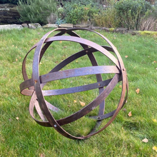 Load image into Gallery viewer, The 80cm rustic garden ball Sculpture outside in the garden on the grass.