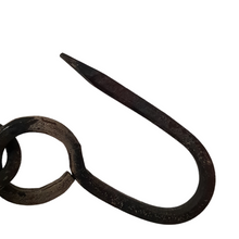 Load image into Gallery viewer, The detail of the chain hook used to hand the fire pit grill to a tripod.