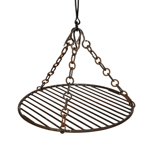 The fire pit grill and chain on a white background.