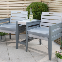Load image into Gallery viewer, The Florenity Grigio Tete a Tete Wooden Garden Bench outdoors in the garden
