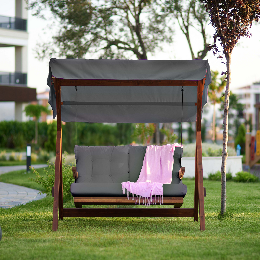 The Sandringham Swing 1700 with Canopy outside in the garden. 