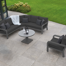 Load image into Gallery viewer, The Timber Round Arm Corner Sofa - Lava on the garden.
