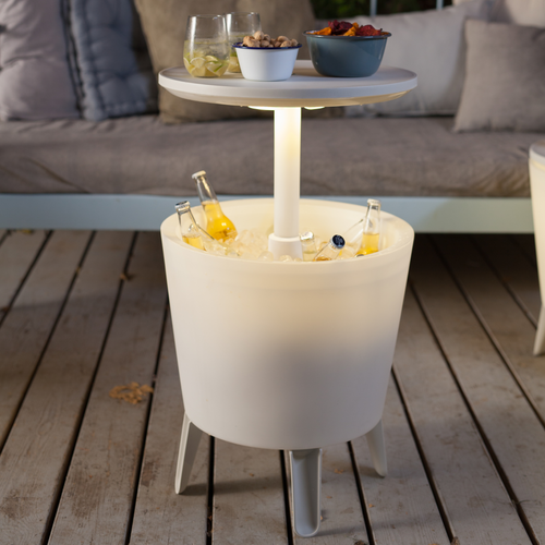 The Keter cool bar with lights on outdoor decking. 