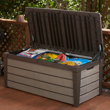 Load image into Gallery viewer, The Keter brushwood storage box opened with garden accessories inside. 
