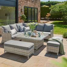 Load image into Gallery viewer, The Wroxham large corner lounge set on the garden patio with scatter cushions and accessories. 
