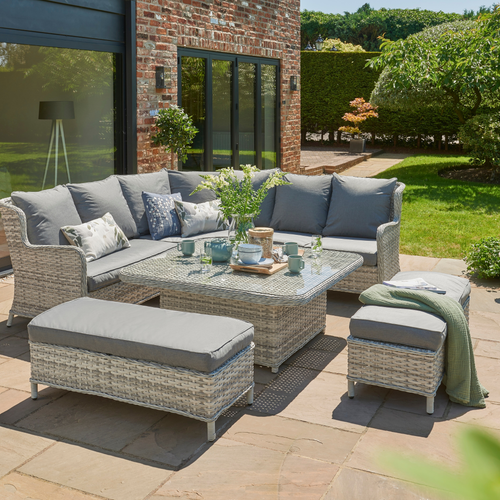The Wroxham large corner lounge set on the garden patio with scatter cushions and accessories. 