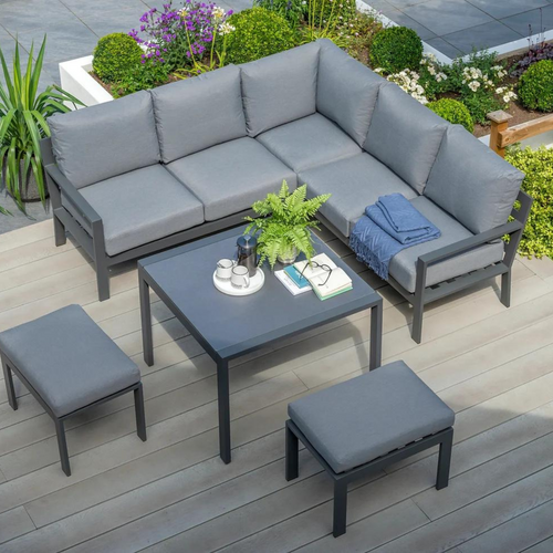 The The Titchwell mini corner lounge set with table on some garden decking. 