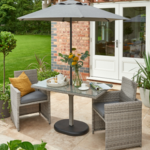 Load image into Gallery viewer, The Wensum Bistro Set outside in the garden
