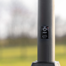 Load image into Gallery viewer, The LED Parasol 2.7m Grey on and off switch for the LED lights on the pole. 

