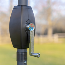 Load image into Gallery viewer, The LED Parasol 2.7m grey adjustable crank mechanism showing up and down on the handle. 
