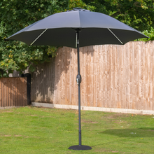 Load image into Gallery viewer, The LED parasol 2.7m in grey outside in the garden. 
