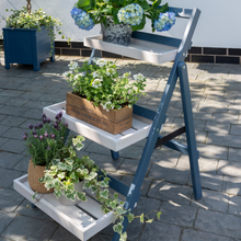 Load image into Gallery viewer, The Florenity Galaxy folding pot shelf outside in the garden.
