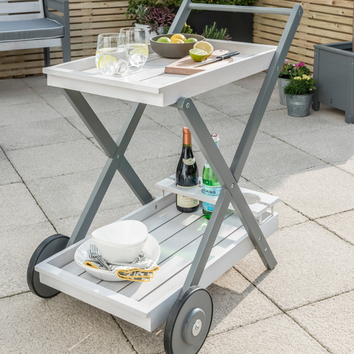 The Florenity Grigio drinks trolley outdoors in the garden.