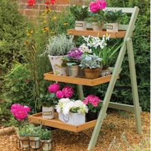 Load image into Gallery viewer, The Florenity Verdi folding pot shelf outside in the garden. 
