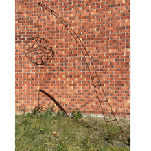 Load image into Gallery viewer, Rustic garden arch sculpture with chain and rustic garden sphere. The full sculpture is shown with a brick background. 
