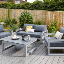 Load image into Gallery viewer, The Mallorca Lounge Set in matt grey outside on some garden decking. 
