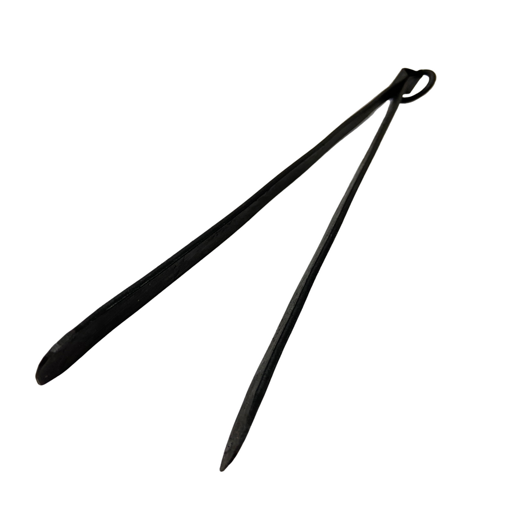 BBQ iron tongs on a white background 