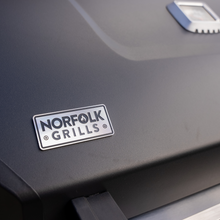Load image into Gallery viewer, The Norfolk Grills logo on the lid of the Atlas 400 gas 4 burner bbq. 
