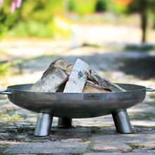 Load image into Gallery viewer, Cook King Bali fire pit outdoors with wood inside. 
