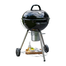 Load image into Gallery viewer, The Norfolk Grills Corus charcoal kettle BBQ on a white background. The Corus kettle bbq shows the under shelf with a tray and condiments on.  
