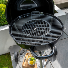 Load image into Gallery viewer, The Corus bbq with the lid open showing the grill underneath. The bbq also has a large black handle for easy transportation if needed. 
