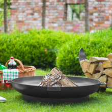 Load image into Gallery viewer, Cook King Dubai fire pit sat on grass with firewood inside
