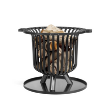 Load image into Gallery viewer, Cook King Verona fire basket on 60cm base floor protector. Shown on a white background. The fire pit has wooden logs inside and both the fire pit and floor protector are black/grey in design. 
