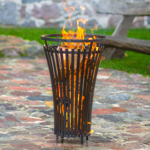 The Cook King Flame fire basket with the fire lit inside the basket. 