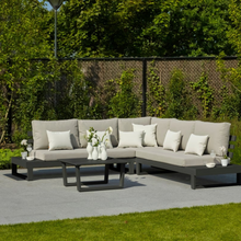 Load image into Gallery viewer, The Ibiza Corner Lounge Set - Lava Grey outside in the garden.
