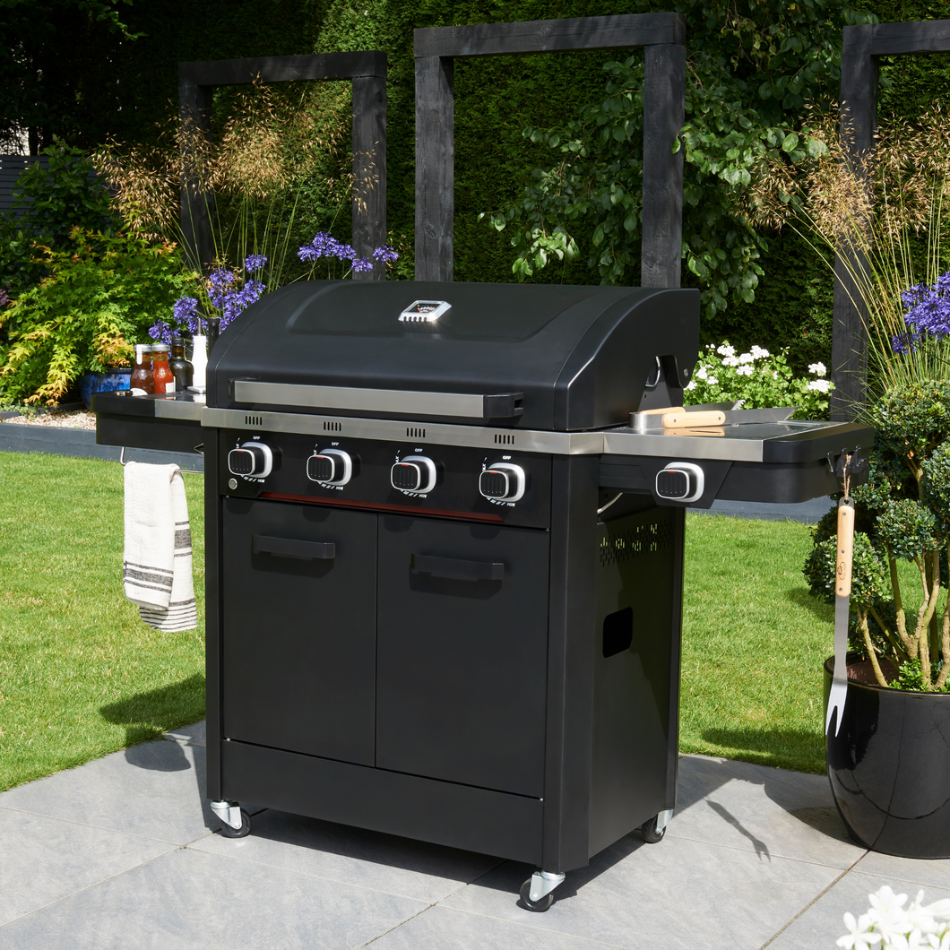 The Norfolk Grills Infinity 400 Gas 4 Burner with Side Burner in the garden. 