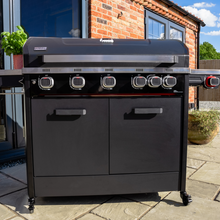 Load image into Gallery viewer, The Norfolk Grills Infinity 500 Gas BBQ with side burner outside in the garden. 
