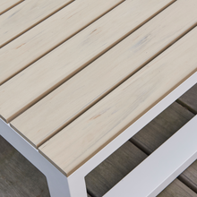 Load image into Gallery viewer, The Mallorca lounge white table top wood detail. 
