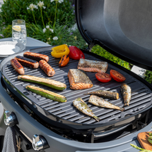 Load image into Gallery viewer, The Norfolk Grills N-Grill Gas BBQ 3 Burner grill showing meats and vegetables grilling. 
