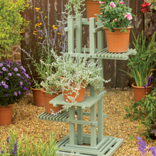 Load image into Gallery viewer, The Florenity Verdi plant stand out in the garden. 

