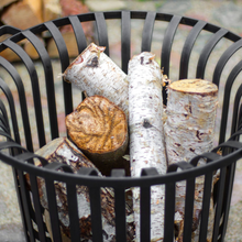 Load image into Gallery viewer, The Cook King Verona 60cm Fire Basket with logs in the basket. 
